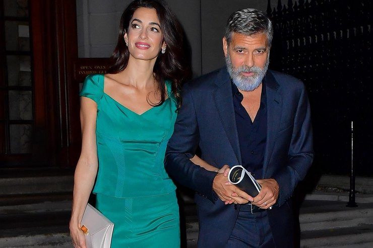 Амал Клуни и Джордж на прицела на папараци (Актьорът защити жена си от преследвачите)